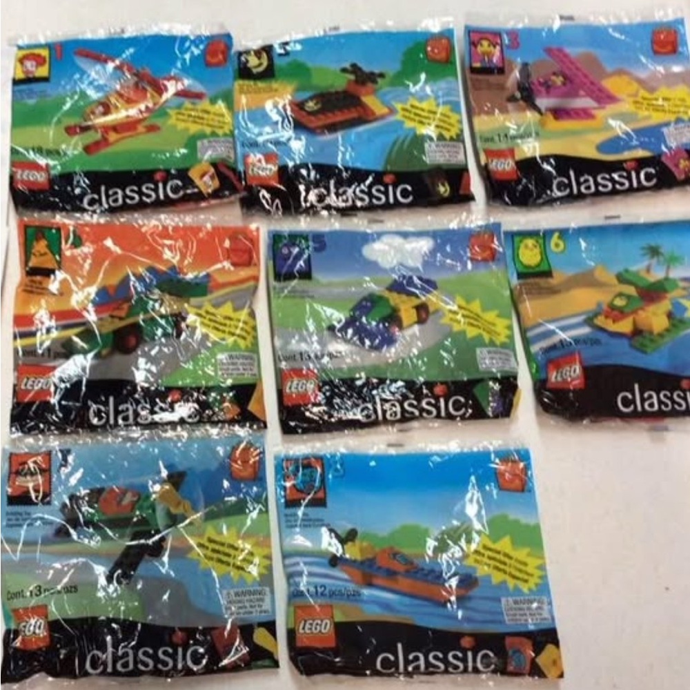 8 Sets Vintage 1999 LEGO Classic Vehicles
Promotional Sealed Polybag Lot